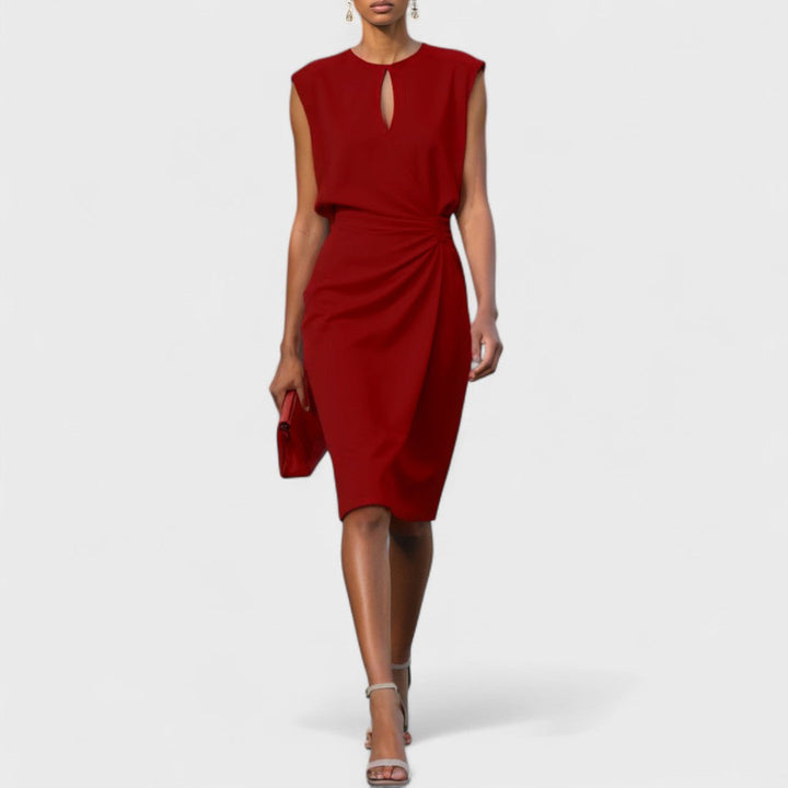 Modern women's midi dress with a sleek fitted design and an attractive side slit. Fashion-forward.