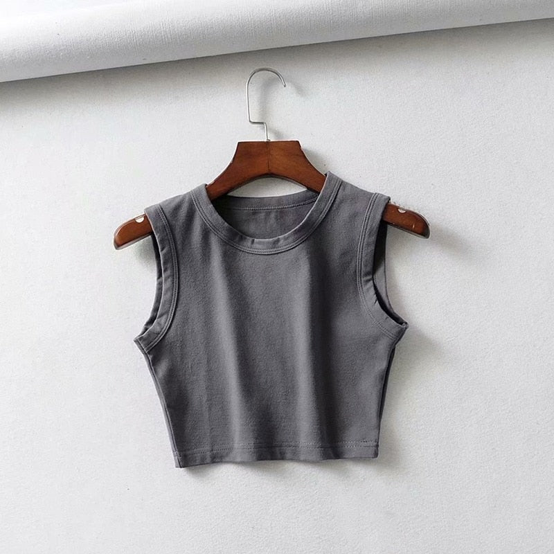 Trendy women's fitted crop top, a stylish sleeveless piece for modern summer fashion.