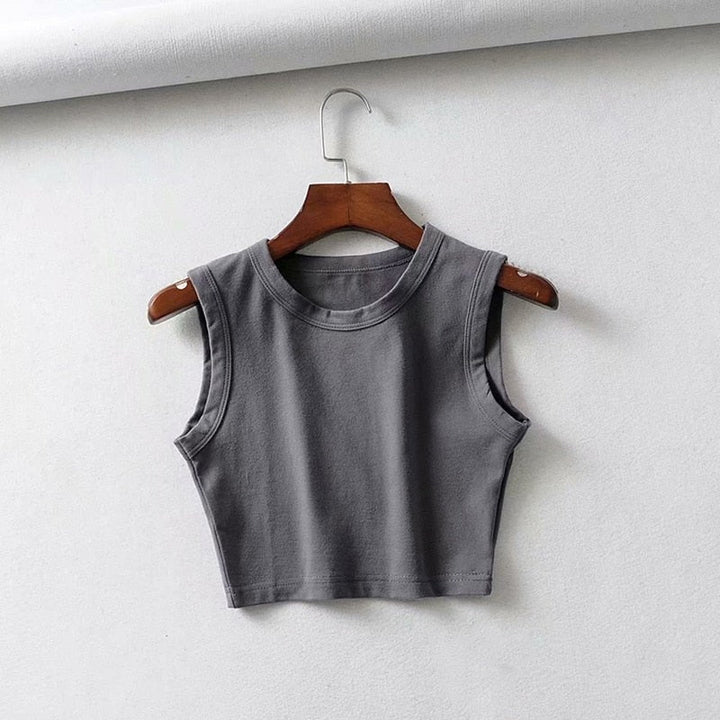 Trendy women's fitted crop top, a stylish sleeveless piece for modern summer fashion.