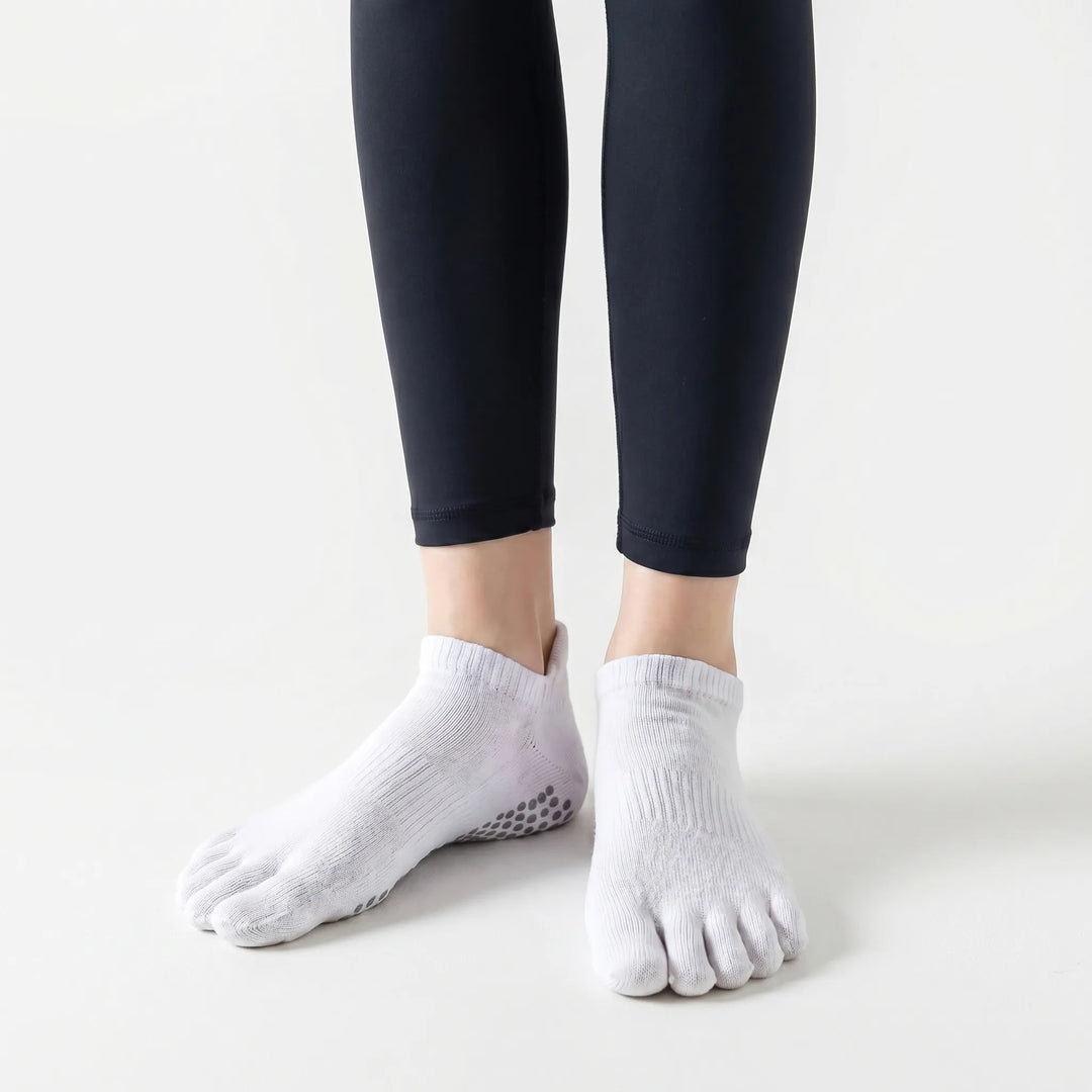 Comfortable women's five-toe grip socks, perfect for Pilates, yoga, and other studio fitness activities.