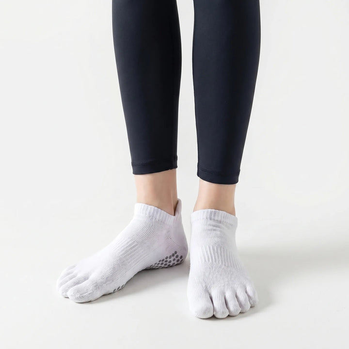 Comfortable women's five-toe grip socks, perfect for Pilates, yoga, and other studio fitness activities.