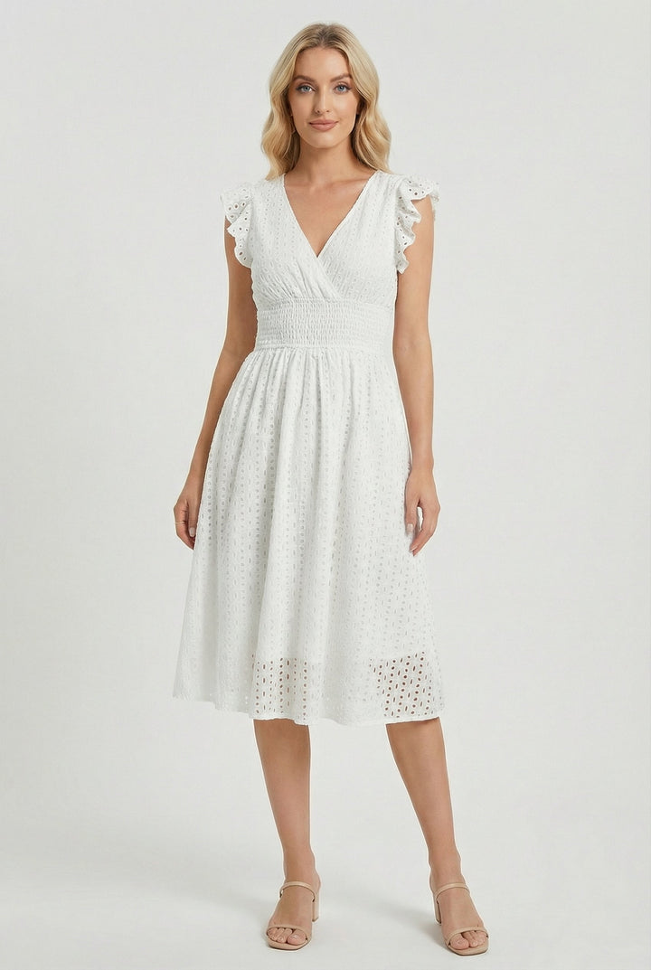 Women's flared eyelet midi dress with ruffled sleeves, perfect for summer.