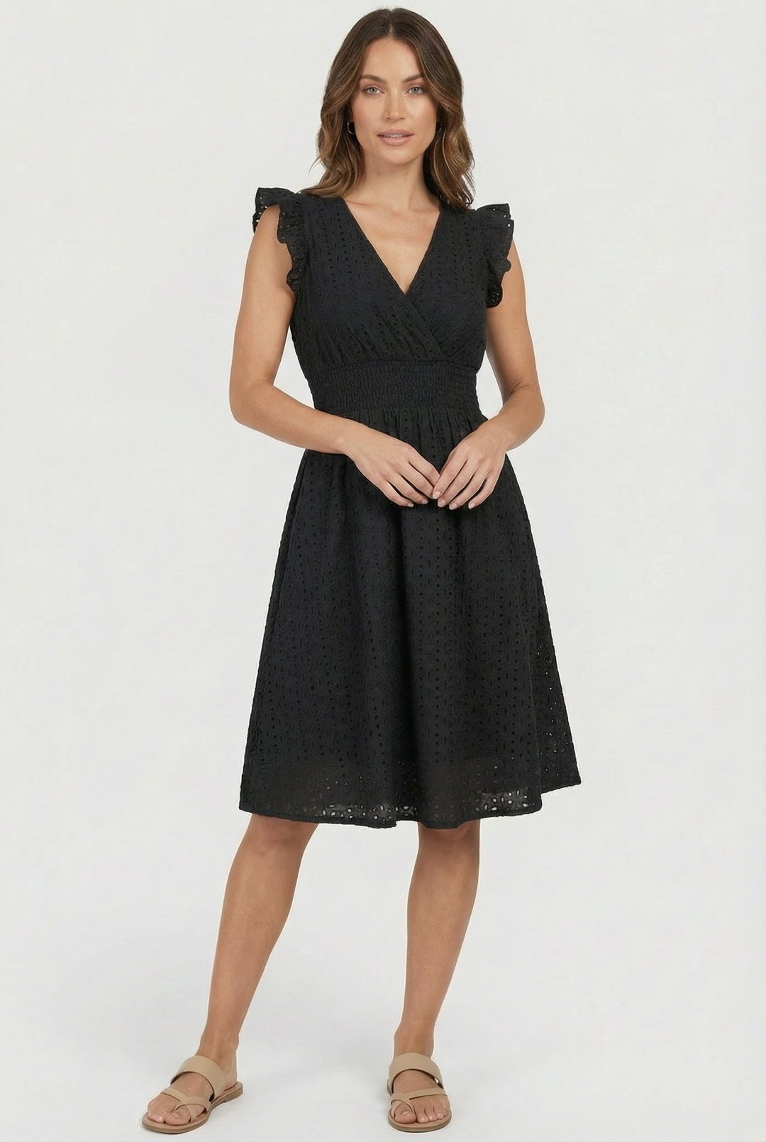 Stylish women's eyelet midi dress, flared, with ruffled sleeves & comfortable smocked waist.