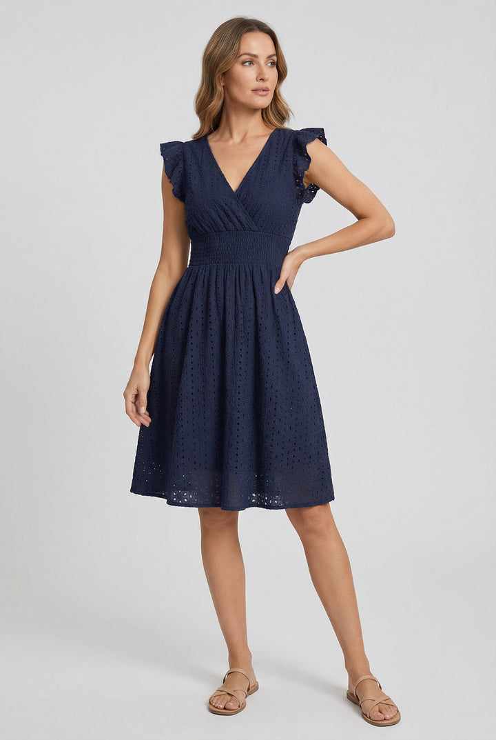 Women's flared eyelet midi dress with charming ruffled sleeves, a perfect summer vacation dress.