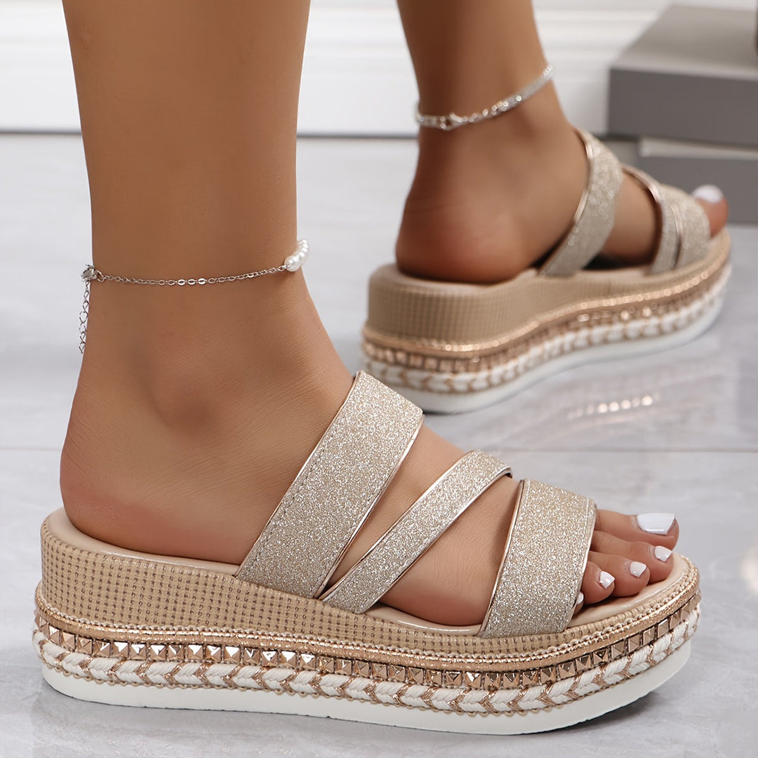 Classic women's flat casual sandals, designed for ultimate comfort & everyday wear. Easy slip-on style.
