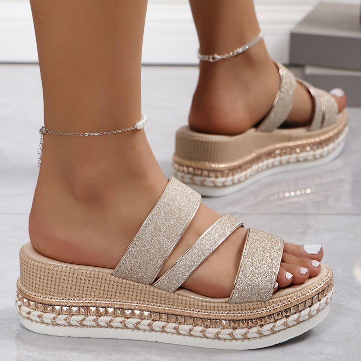 Classic women's flat casual sandals, designed for ultimate comfort & everyday wear. Easy slip-on style.