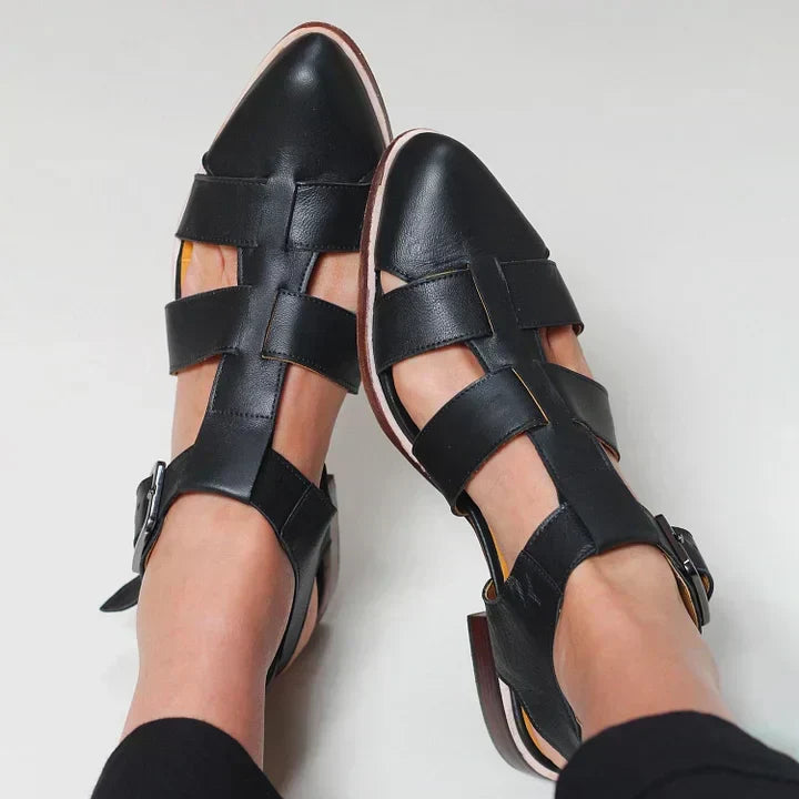 Comfortable women's flat sandals, ideal for daily casual wear. Stylish open-toe design with secure adjustable straps.