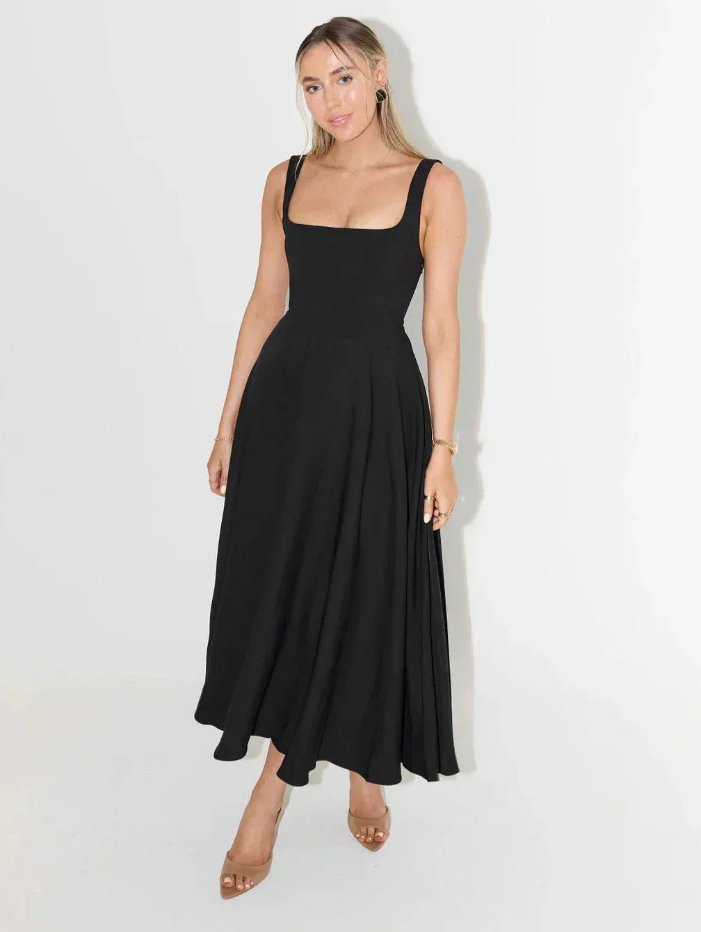 Elegant women's square neck midi dress, flattering, chic, and versatile for summer occasion wear.