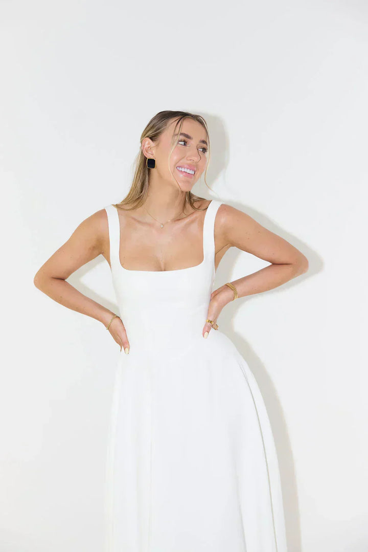 Flattering square neck midi dress for women, a timeless and elegant design perfect for warm weather.