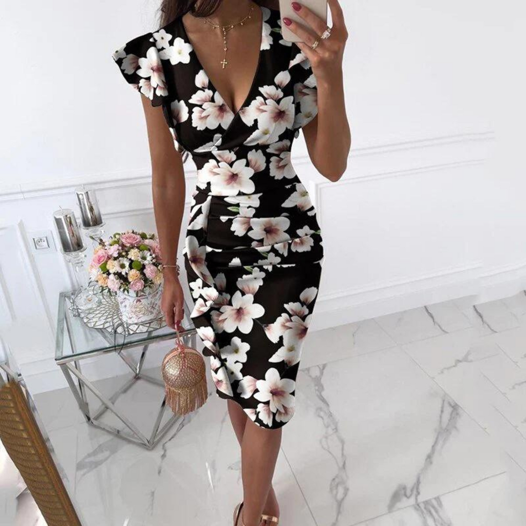 Women's flattering V-neck summer midi dress, fitted for versatile style.