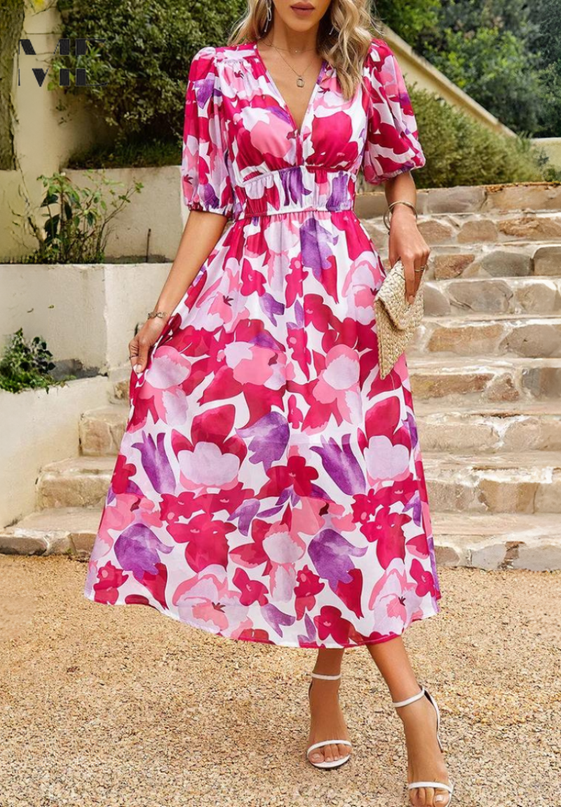 Breezy women's floral A-line midi dress with short sleeves, perfect for vacation.