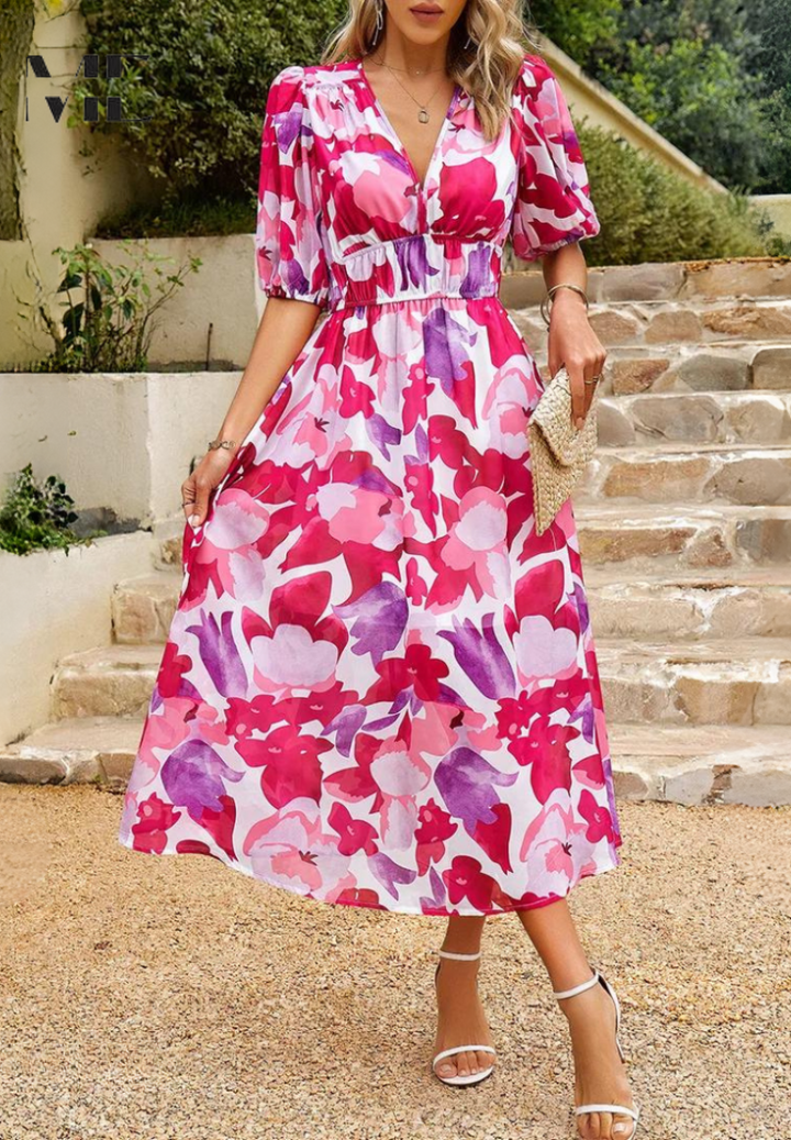 Breezy women's floral A-line midi dress with short sleeves, perfect for vacation.