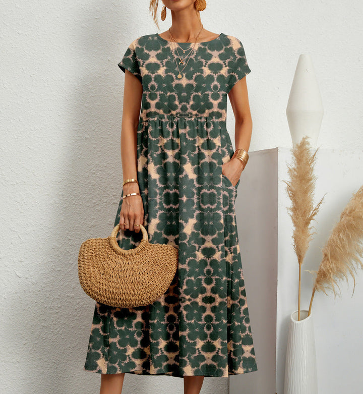 Women's floral A-line short sleeve summer dress. Comfortable knee-length print for casual everyday wear.