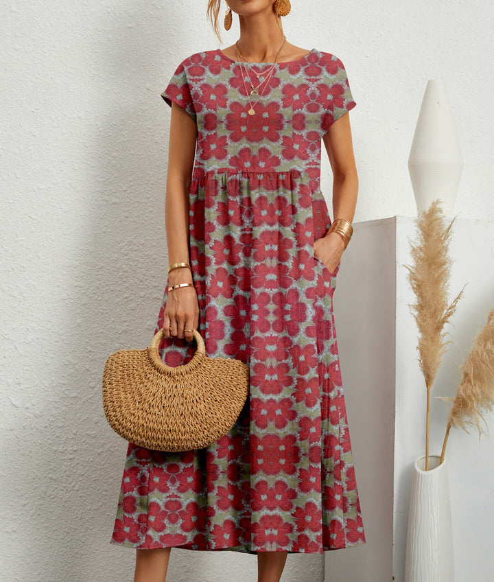 Stylish dark green floral A-line dress for women. Short sleeve, knee-length, perfect for comfortable casual summer wear.