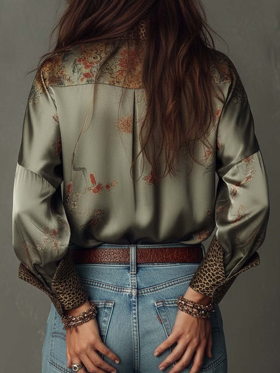 Versatile women's floral top with leopard print cuffs & collar, a fashionable button-down blouse.