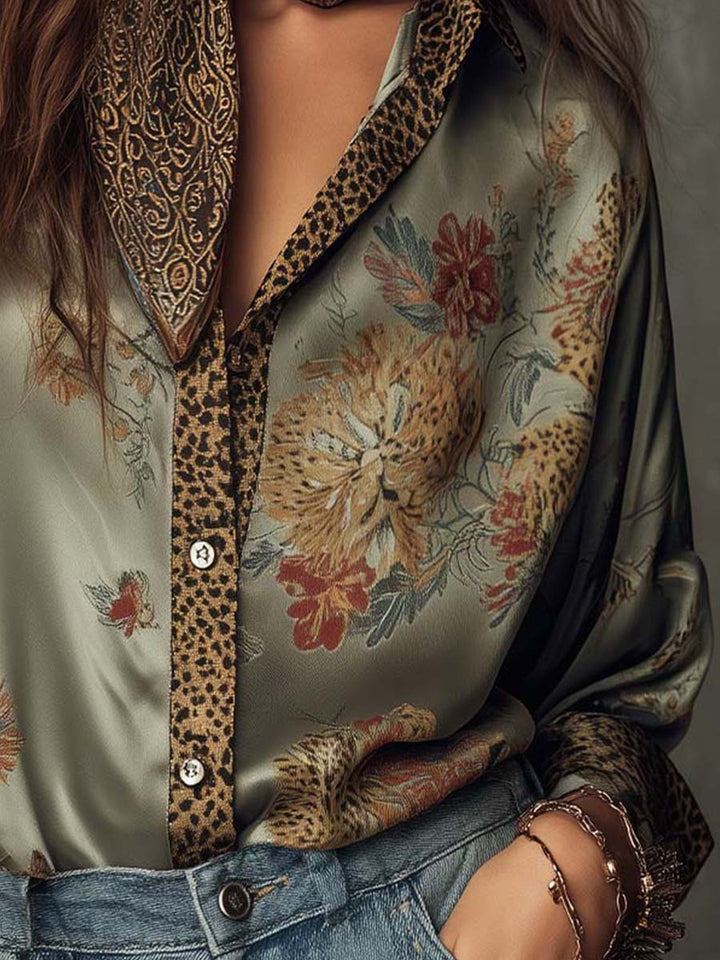 Statement floral button-down shirt for women, elegant long sleeve top with chic leopard trim.