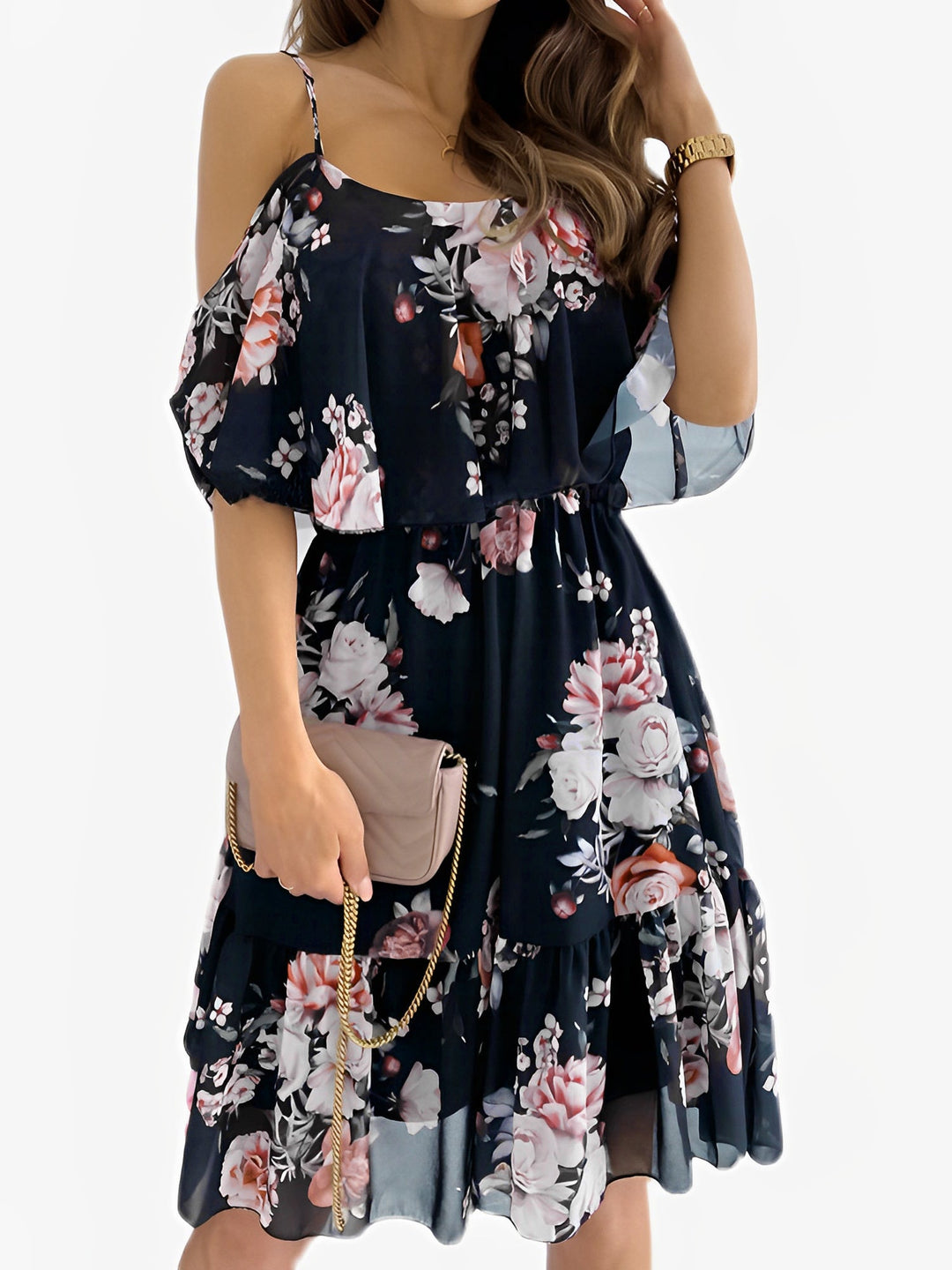 Detailed view of cold shoulder design on women's floral mini dress, highlighting shoulder cutouts & ruffles.
