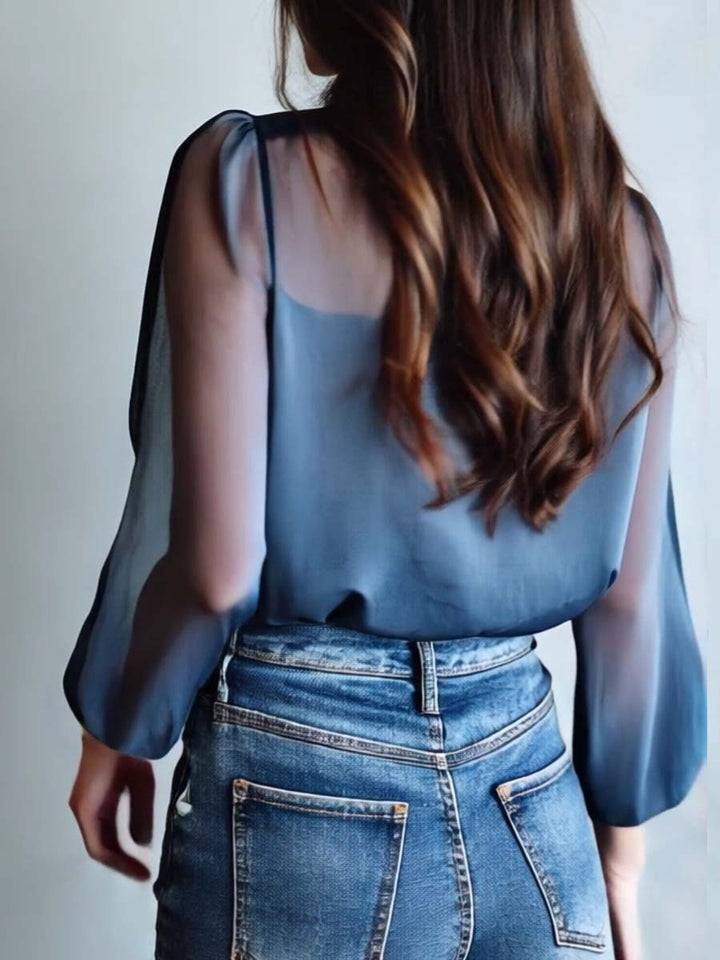 Elegant floral embroidered blouse for women, featuring sheer sleeves & a relaxed fit for comfort.