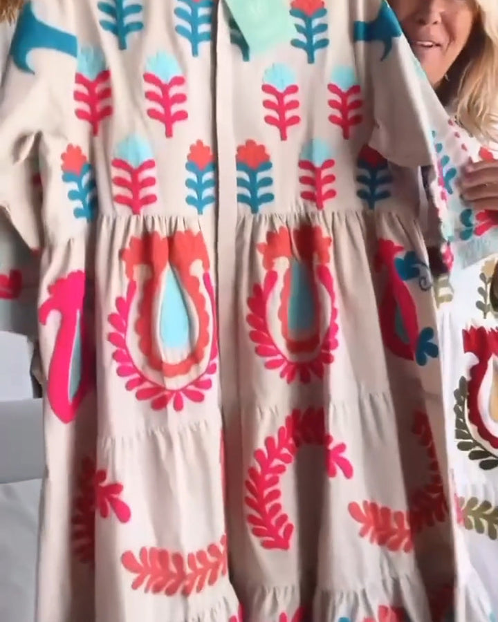 Comfortable women's floral midi dress, graphic design, flowy for vacation and casual outings.