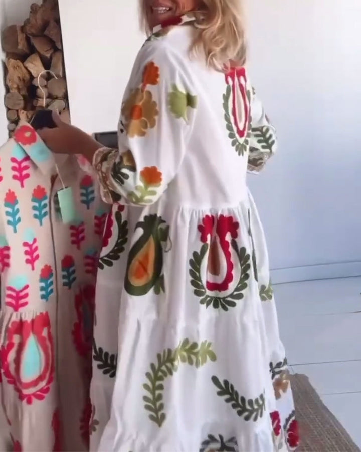 Chic women's floral graphic midi dress, A-line cut, perfect casual or summer vacation style.