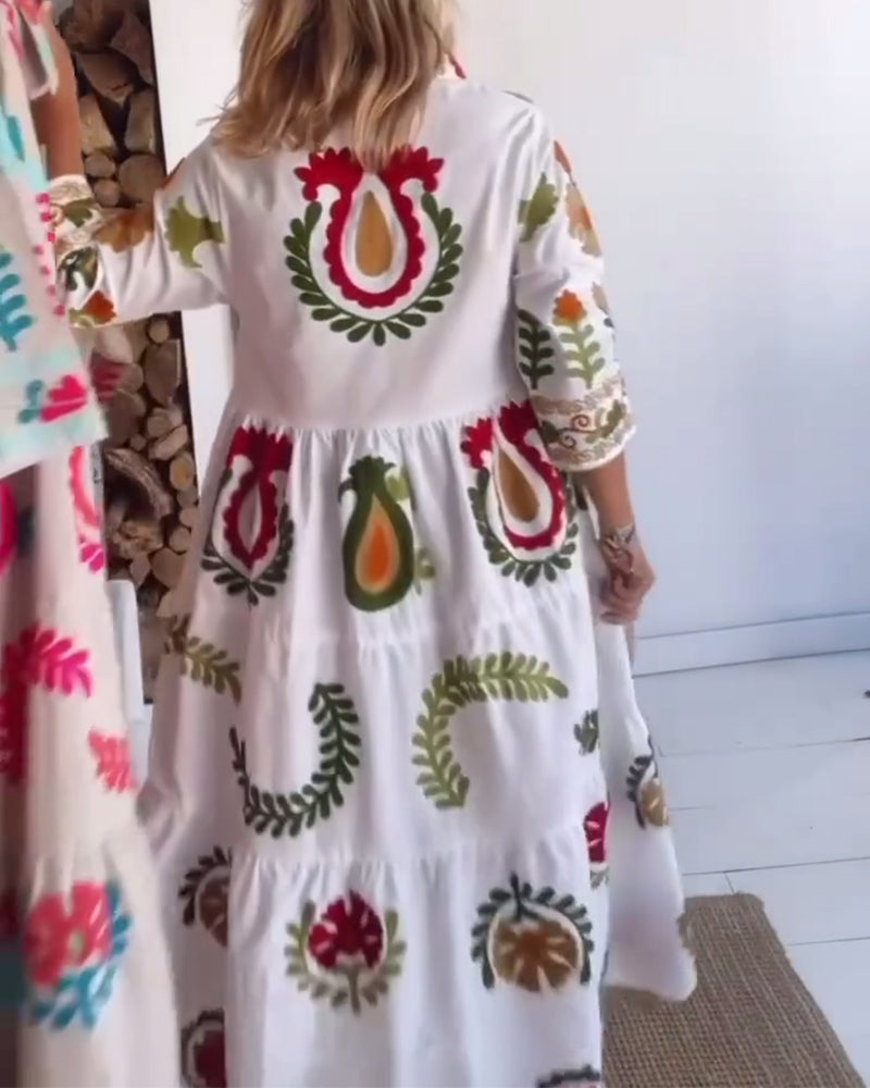 Stylish women's graphic print midi dress, floral design, comfortable and perfect for summer.
