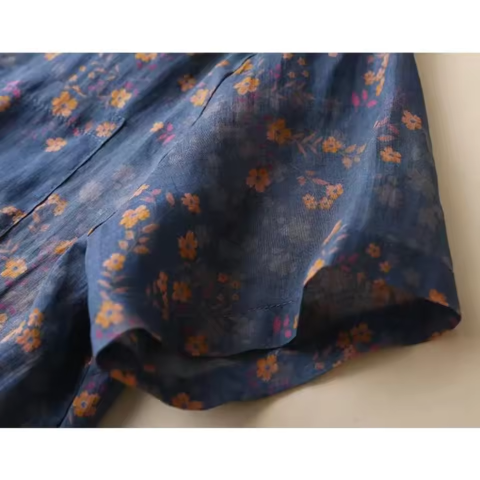 Beautiful women's floral half-placket button shirt, a versatile and comfortable printed blouse for relaxed summer style.