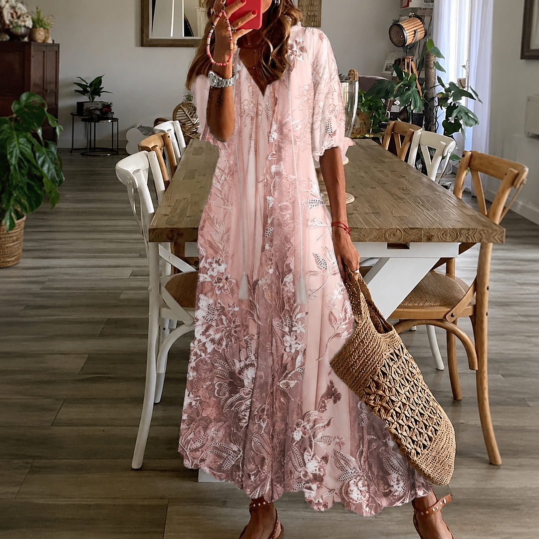 Women's floral maxi dress with half sleeves, perfect for effortless summer style. Flowy, comfortable, and elegant.