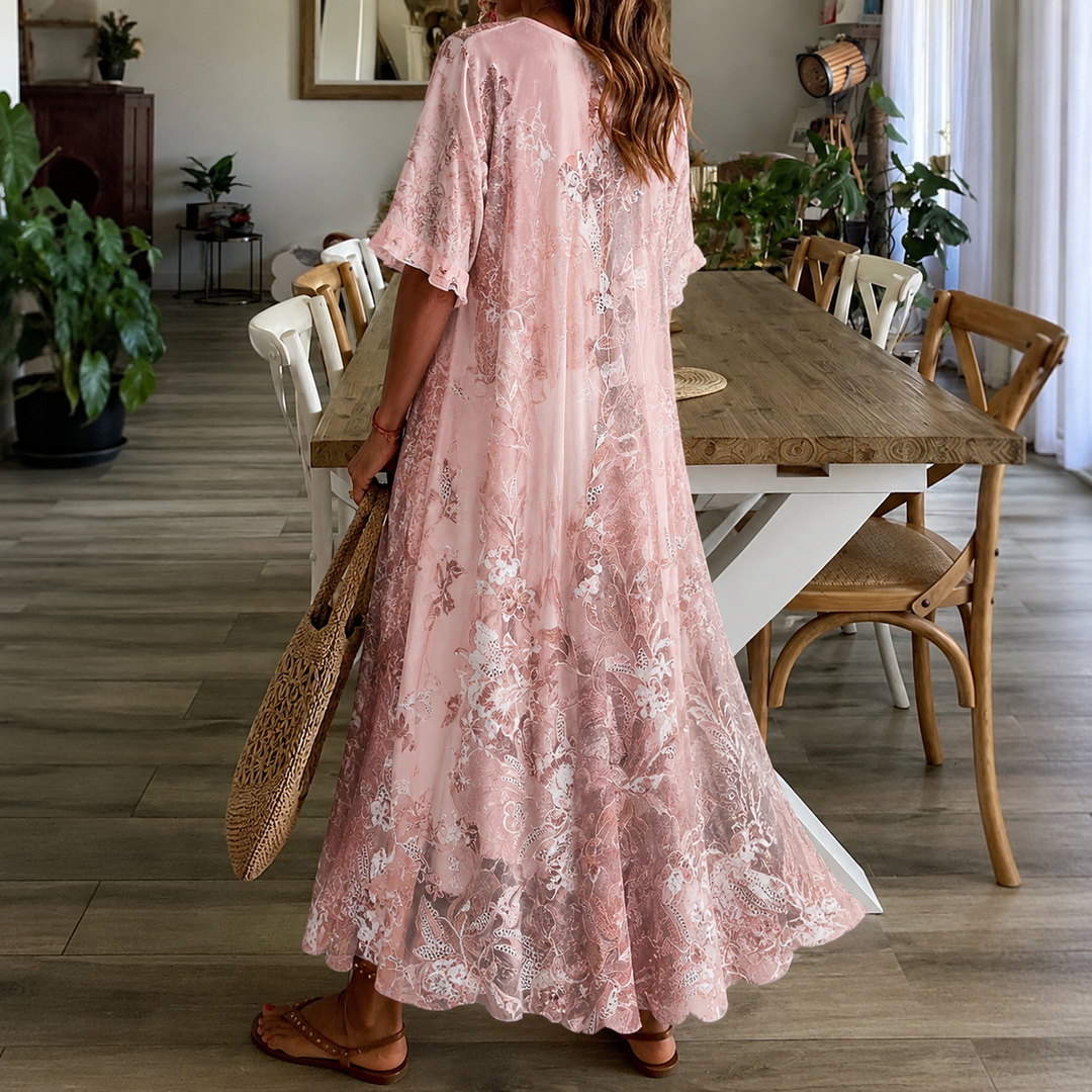 Elegant women's floral maxi dress, featuring a split neck & half sleeves. Ideal for garden parties or beach vacations.