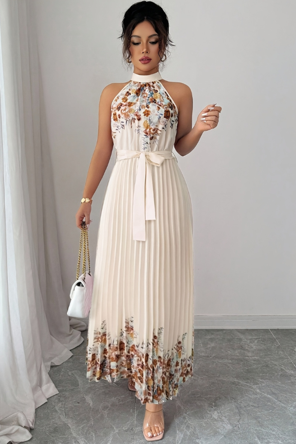 Flattering women's floral dress, sleeveless and pleated, with a square neckline.