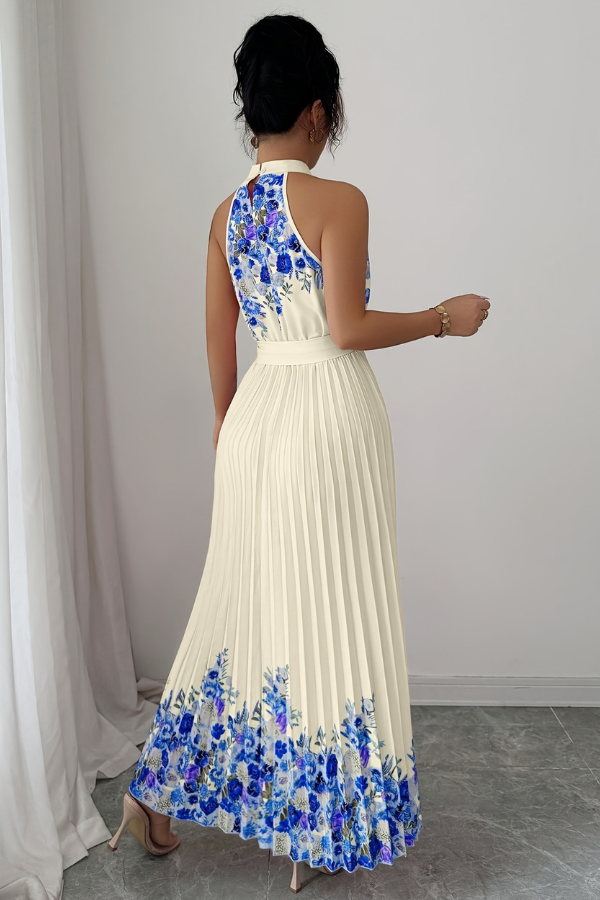 Breezy sleeveless floral midi dress with a stylish square neck and delicate pleats.