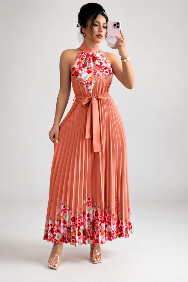 Chic summer floral midi dress with a flattering square neck and beautiful pleats.
