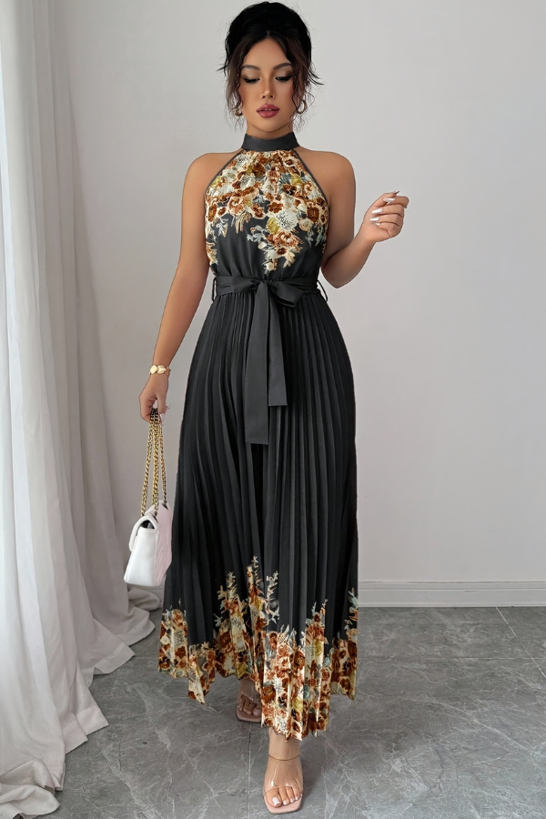 Elegant square neck midi dress, sleeveless with a vibrant floral print and pleats.
