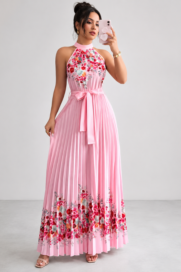 Flowy sleeveless midi dress with delicate floral print and square neckline.