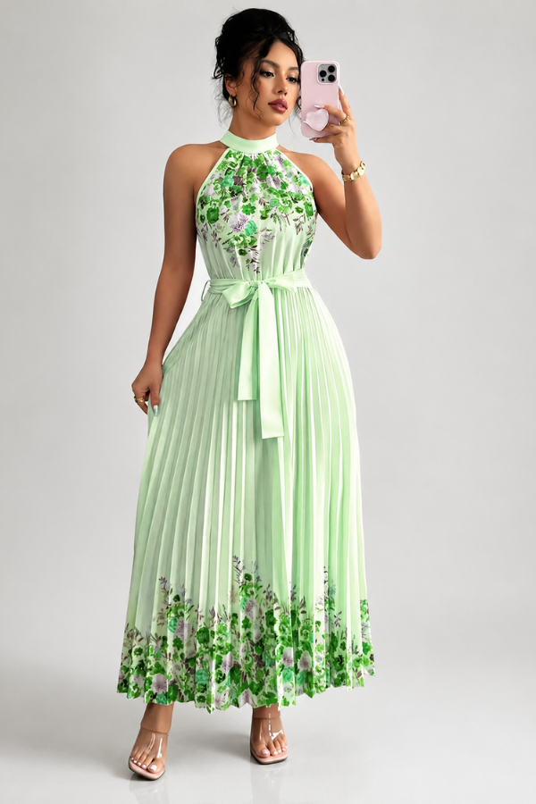 Summer style sleeveless dress with square neck, floral print, and pleats.