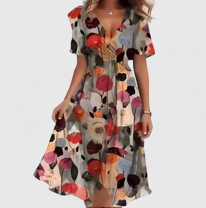 Chic women's floral print midi dress with a V-neck and flutter sleeves. Ideal for summer events & parties.