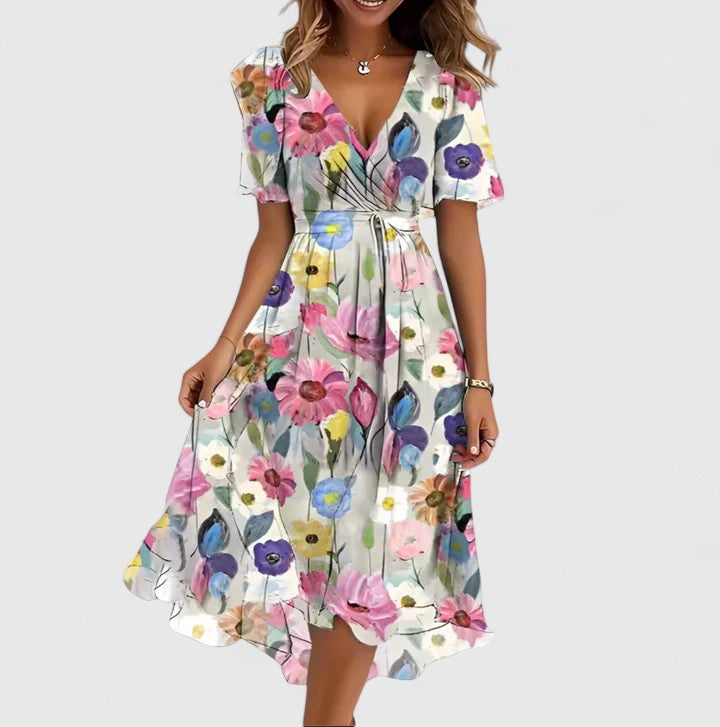 Beautiful women's floral party dress, midi length, plunge V-neck & delicate flutter sleeves. Occasion wear.