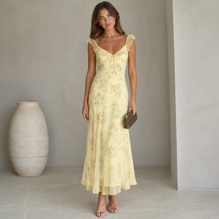 Women's floral print beach dress, perfect for summer vacations. Sleeveless & lightweight.