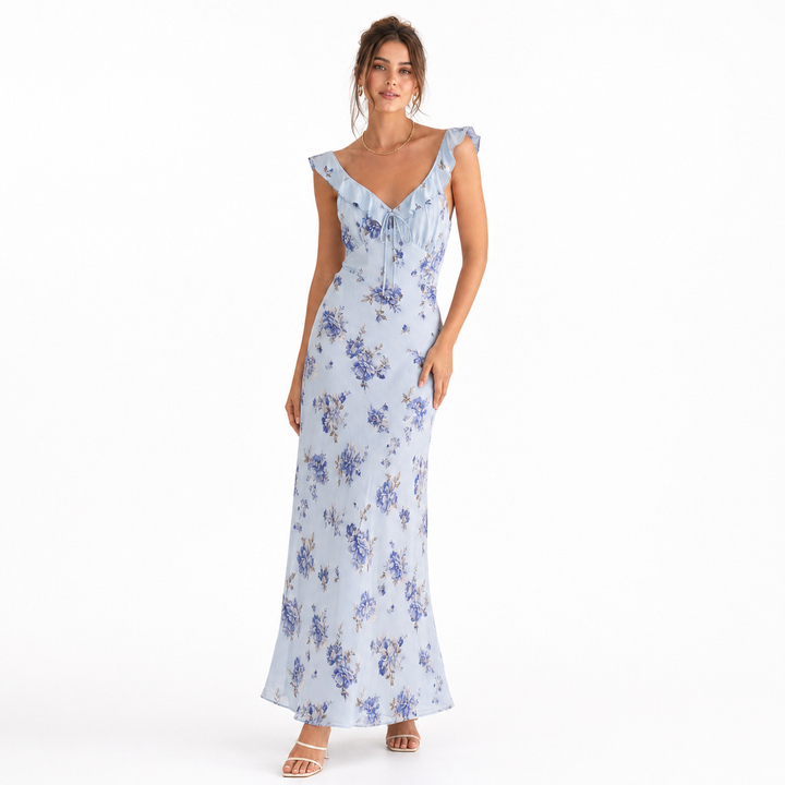 Chic women's floral sun dress, backless design for a breezy vacation look. Sleeveless beachwear.