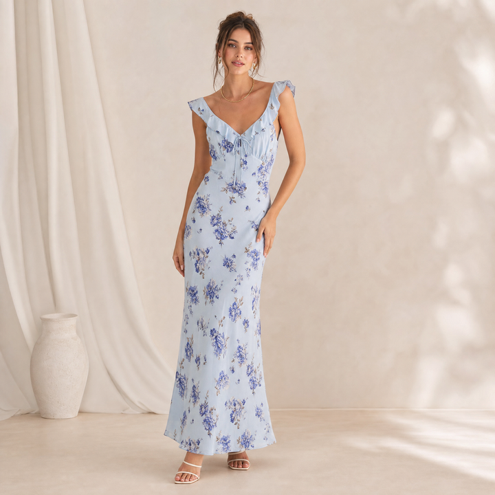 Vibrant floral pattern on a women's backless sleeveless beach dress, comfortable for sunny days.