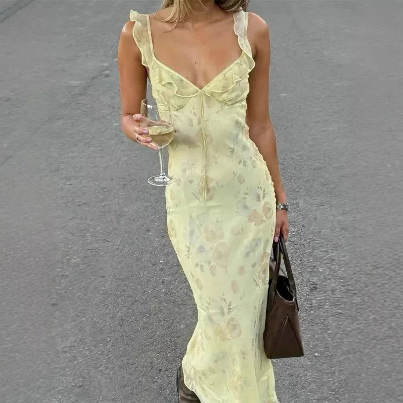 Breathable women's floral beach dress with a stylish backless cut, great for warm summer weather.