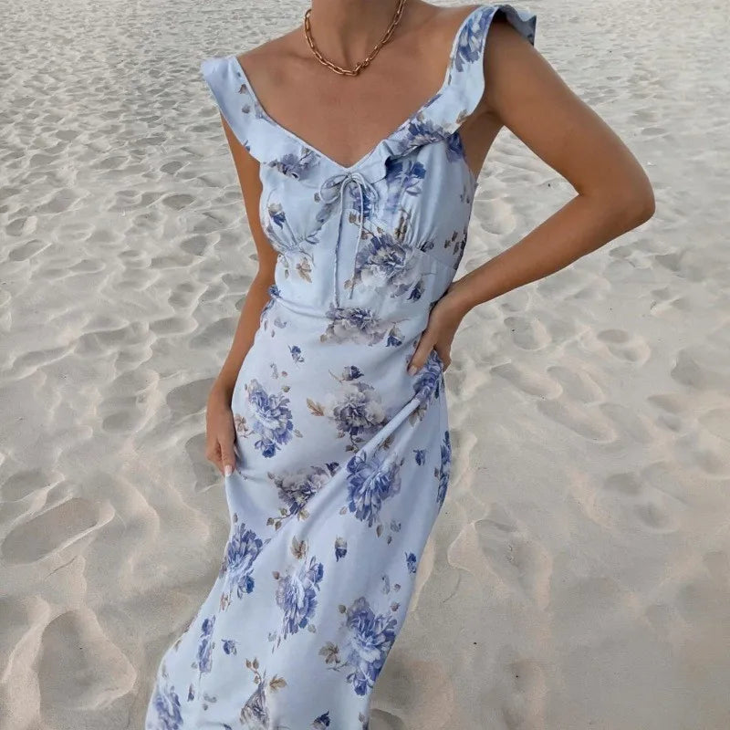 Fashionable women's floral backless sleeveless beach dress, perfect as a summer sun dress.