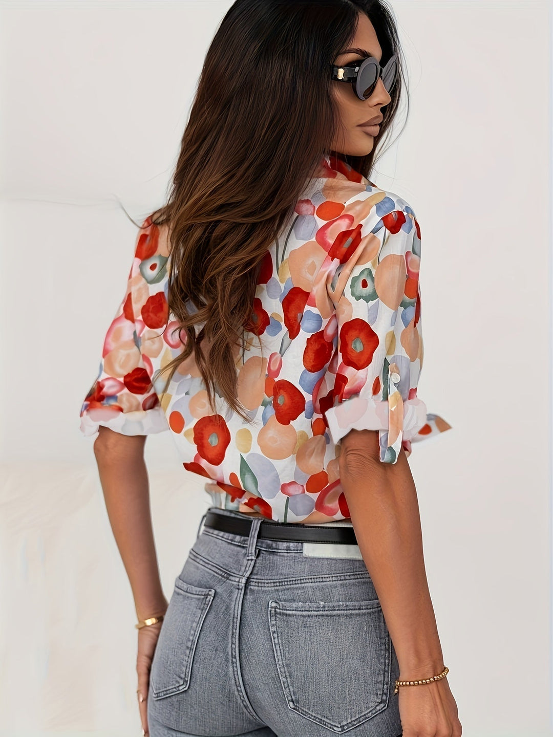 Relaxed fit women's floral button-down long sleeve top, a versatile piece for smart casual spring outfits.