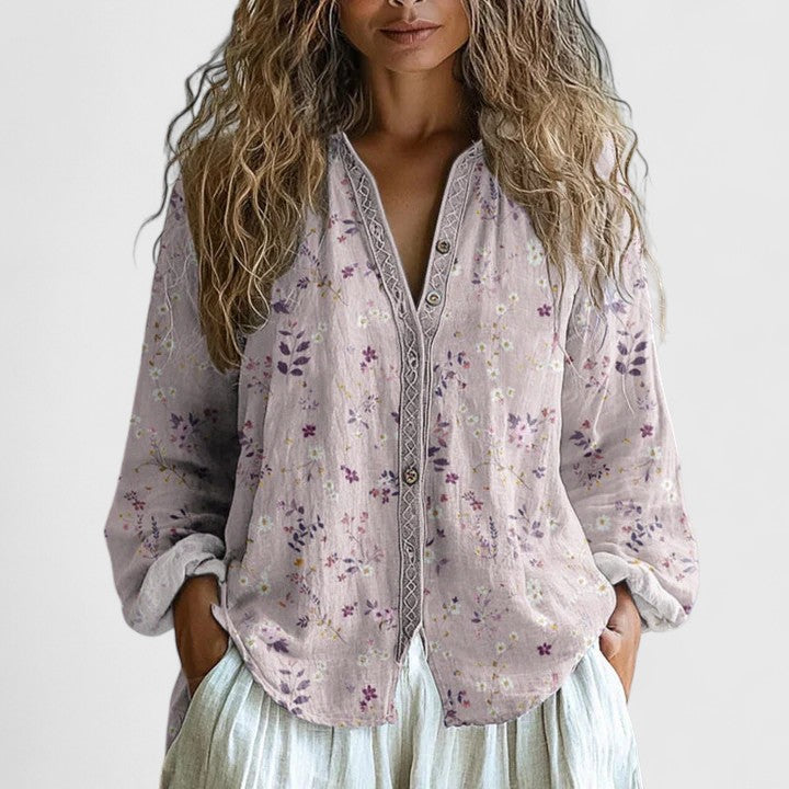 Lightweight women's v-neck floral blouse, available in purple, pink, or green. Casual long sleeve bohemian top.
