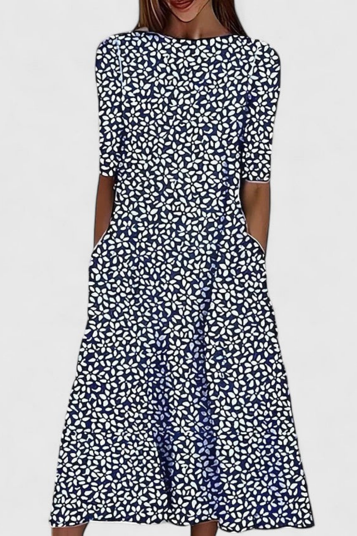 Comfortable women's floral print midi A-line dress, relaxed fit, short sleeve, with essential pockets. Summer style.