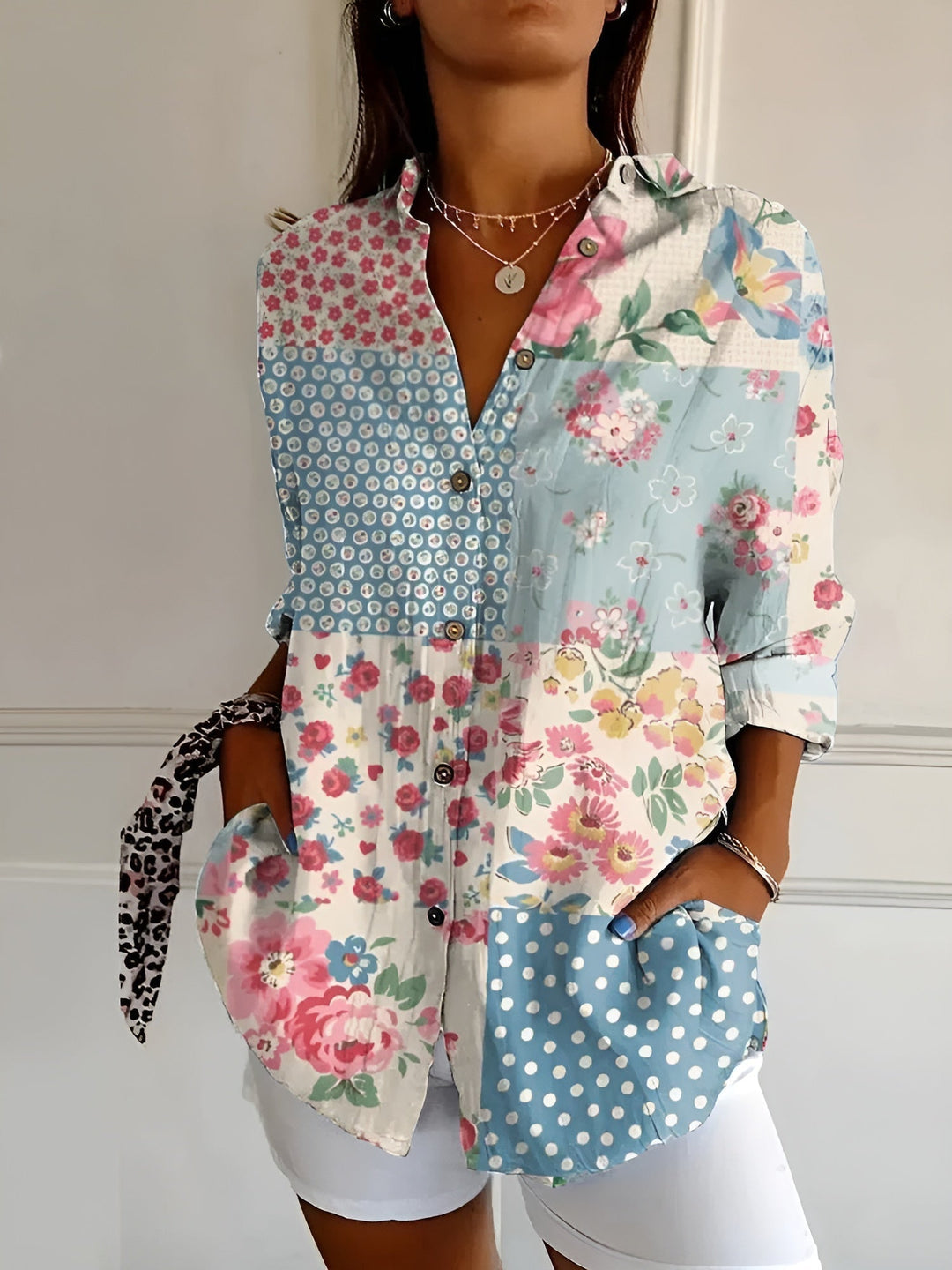 Relaxed fit women's floral print long sleeve blouse. Oversized button-down shirt for warm weather style.