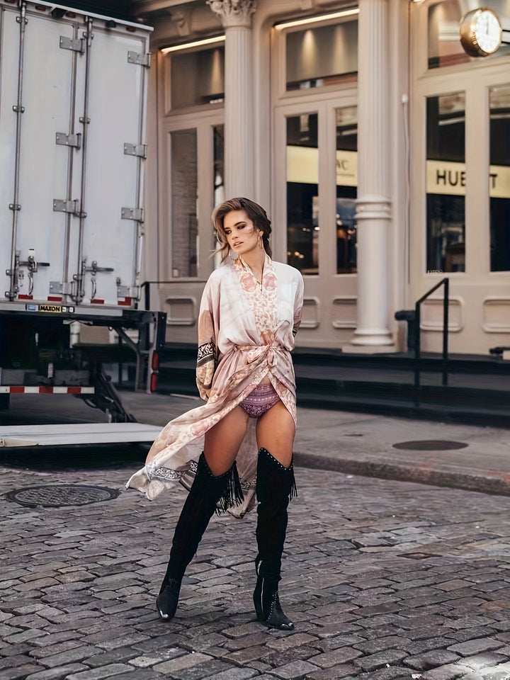 Chic women's floral kimono, a beautiful resort wear piece & lightweight beach coverup for effortless summer style.