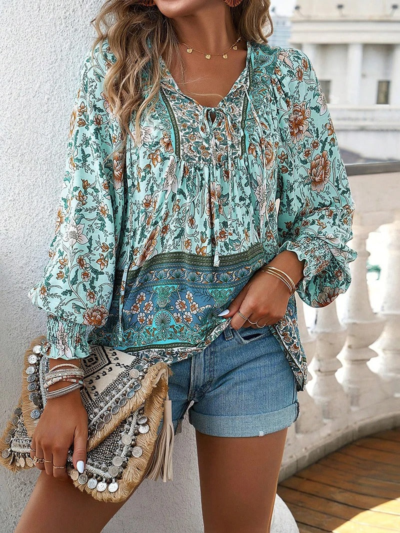 Vibrant floral print women's puff sleeve top, a chic choice for summer outfits.