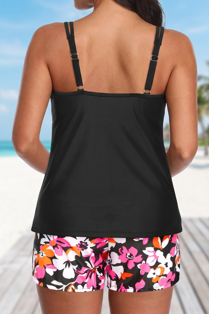 Elegant women's floral tankini and shorts set, ideal two-piece swimwear for a fashionable poolside or beach outfit.
