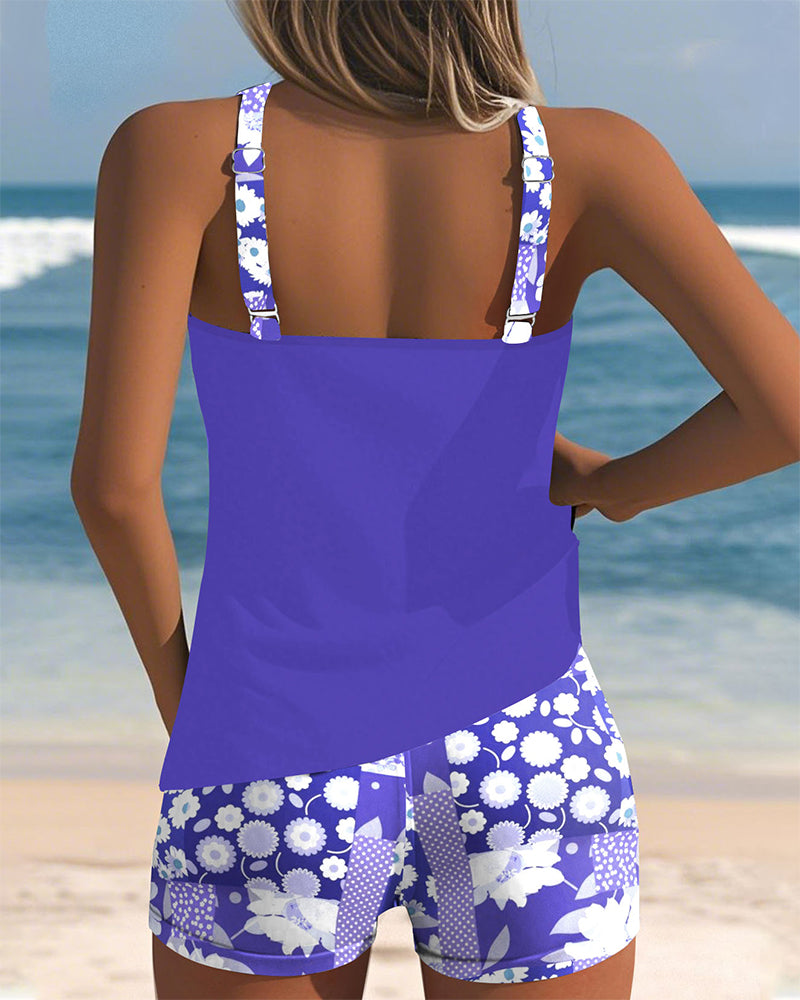 Stylish floral tankini top and swim shorts, a must-have women's two-piece beach vacay swimsuit.