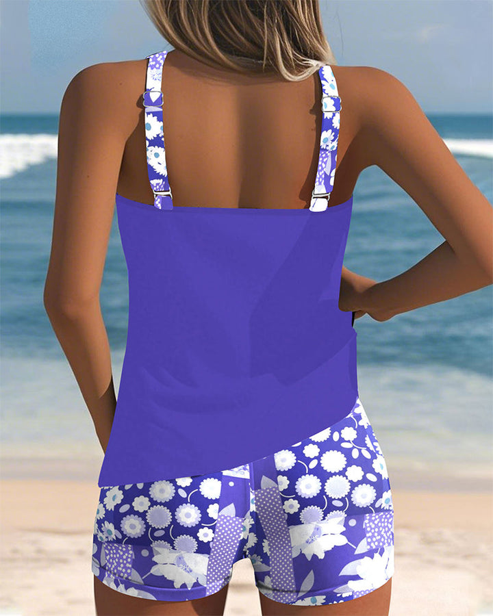 Stylish floral tankini top and swim shorts, a must-have women's two-piece beach vacay swimsuit.